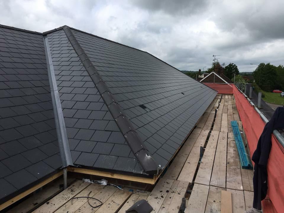 Avid Roofing team completing a re-roof in Surrey